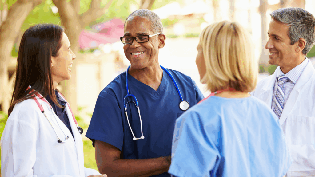 Healthcare team discussing enjoying some free time, a potential non-financial medical scribe ROI